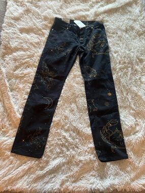 Women’s Black Straight-Leg Jeans with Gold Zodiac Motif